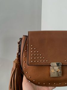 Faux leather saddle bag with stud