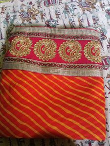 Orange Leheriya Saree with Embellished Border