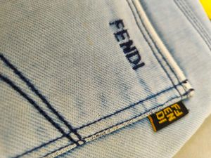 Distressed Light Wash Denim Jeans