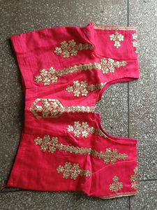 Beautiful Carrot Colour Blouse With Back Design