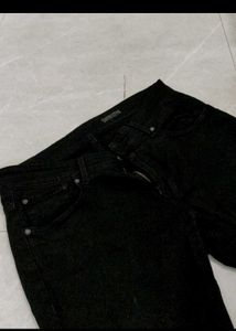 A Black Spykar Denim Jeans