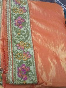 Elegant Unstitched Golden Blouse &amp; Orange Saree