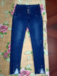 Dark Blue Jeans With Cut On Left Leg..