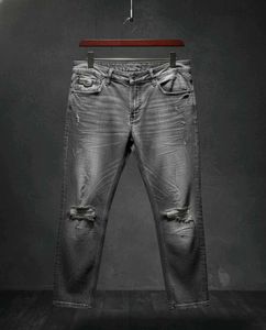 Ripped Grey Jeans