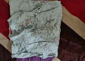 Stylish Sky Blue Colour Top With Floral Print