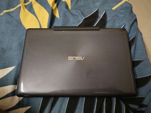 Asus mini windows touch laptop bacome Tab
