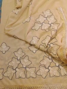 Cream embroidery Saree