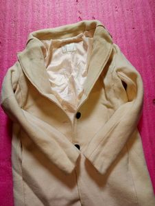 beige colour overcoat
