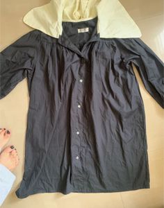 Avant-Garde Black Dress with White Collar