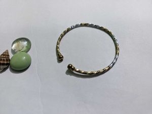 Elegant Gold And Silver Bracelet