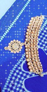 golden choker set with teeka