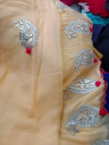 yellow gotta Patti saree.even no fall stich....totally new it