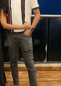 Distressed grey jeans