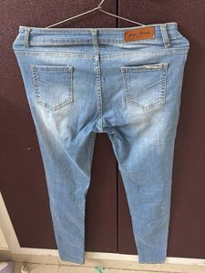 Ripped Light Wash Jeans
