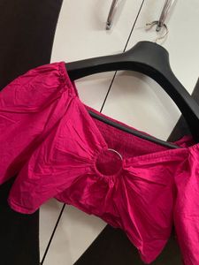 Hot pink puff sleeve top
