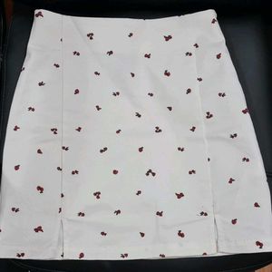 Factorie white mini skirt with a cherry print.