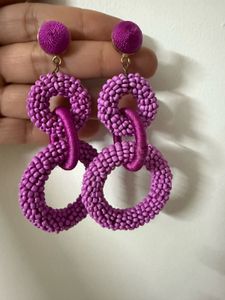 Purple/ mauve dangling earrings