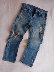 Distressed Blue Wash Denim Jeans
