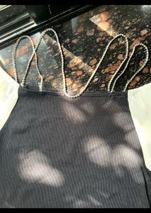Off shoulder top with rhinestone neckline