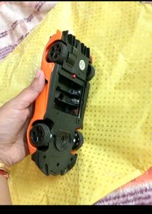 Vibrant Orange Coloured Car Toy Battery Operated