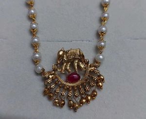 Choker With Pink Stone And Elephant Design