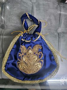 Elegant Blue Embroidered Pouch