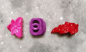 Combo of 2 small clutchers and a hair clip