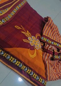 Elegant red and mustard Saree