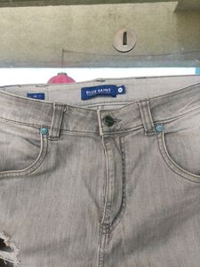 Highly Distressed Jeans In Grey