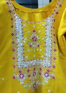 Yellow Salwar Kameez with Pink Dupatta