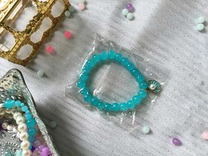 Pink Beaded Bracelet with Shell Charm