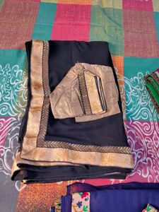 Pure Georgette black saree with lace