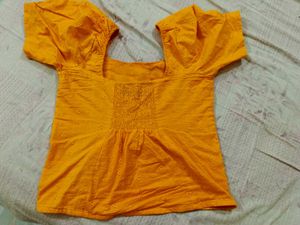 Selling Yellow Top