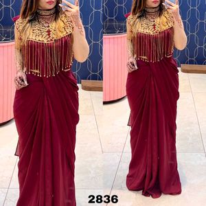 Maroon & Gold Embellished Saree