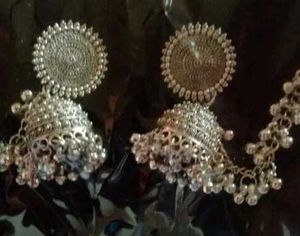 Silver Jhumka Earrings With Combo Of A Bracelet