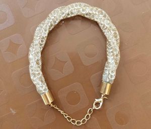Golden Bracelet With Shimmering Diamonds Accents