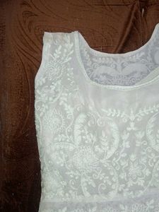 A Mint Green Floral Gown .
