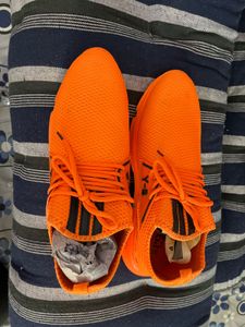 Orange sports shoes for mens