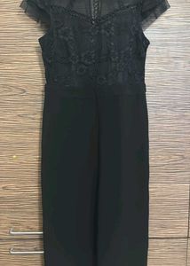 Chic Black Jumpsuit with Sheer Detail