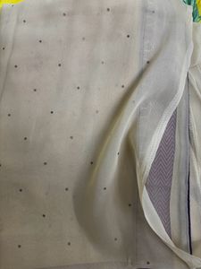 Beautiful Cream colour Saree With Purple Border