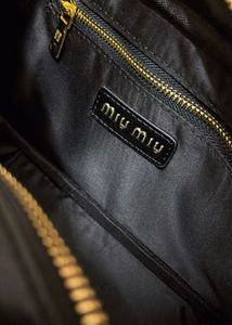 Miu-Miu Quilted Handbag