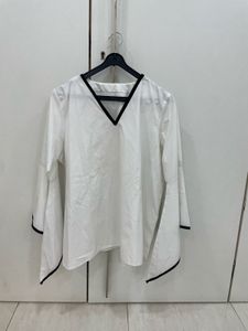 🌟 Monochrome Magic: Bell-Sleeve Statement Top! 🤍