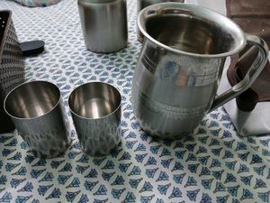 Steel Kitchen Canisters And Glass Jug