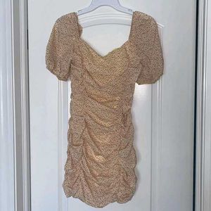 nude floral ruched mini dress with puff sleeves