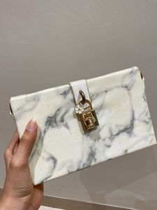 Marble Clutch with Gold Lock