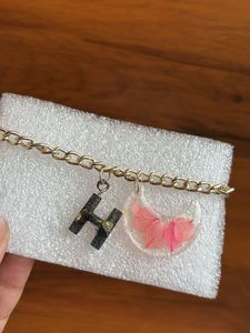 Bracelet with initial letter and real flower
