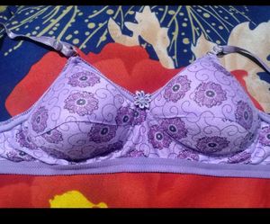 UNUSED PURPLE BRA. PADDED. SIZE 34