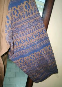 Brown T-shirt with Patterned Blue SleevesCita