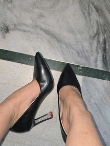 used red bottom black pointed heels