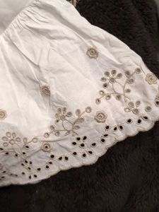 White Embroidered Peplum Top